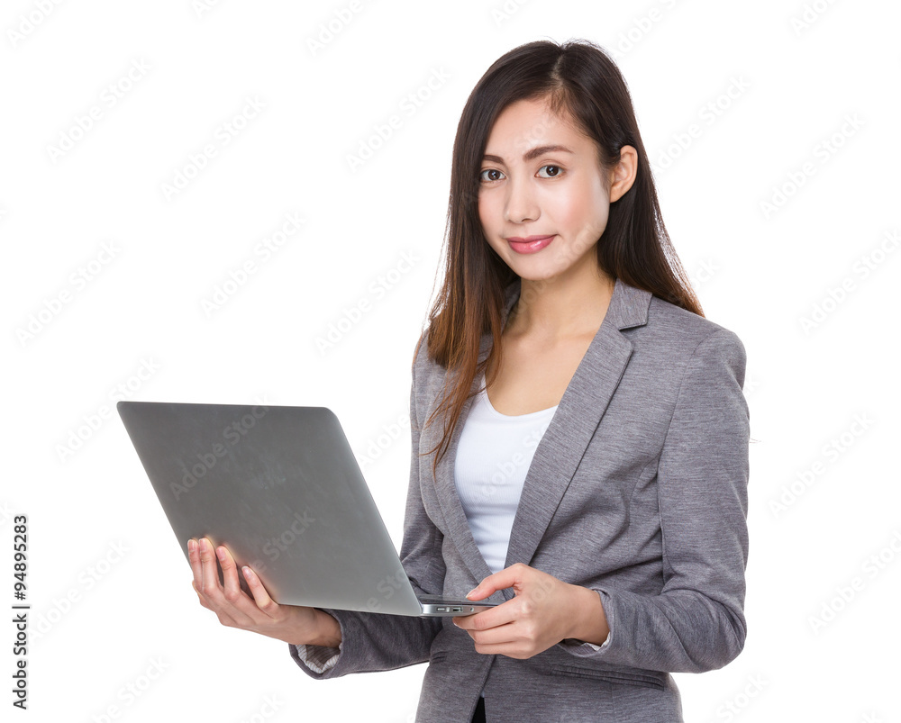Asian Businesswoman use of the laptop computer Asian Businesswoman use of the laptop computer