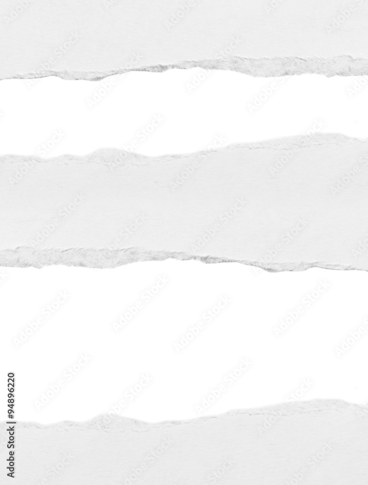 Hole ripped in white paper Hole ripped in white paper