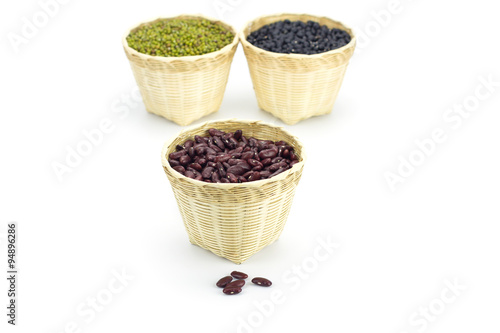 Kidney beans in bamboo basket isolate on white