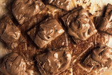 Homemade chocolate brownies on dark background