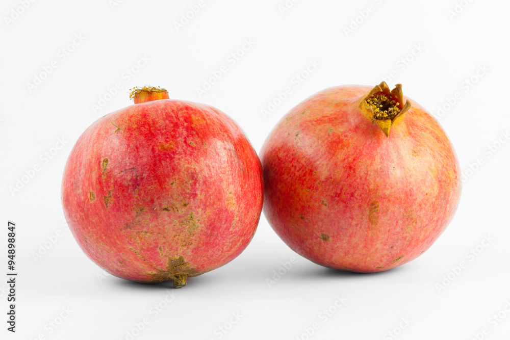 Ripe pomegranate isolated on white background Ripe pomegranate isolated on white background