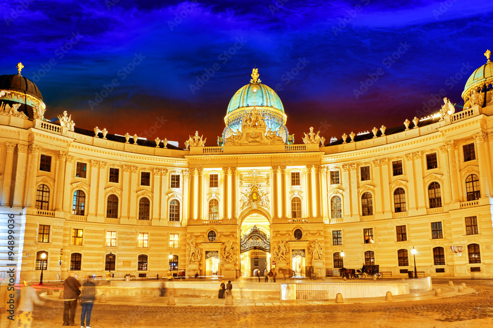 Hofburg Palace seen from Michaelerplatz, wide-angle view at dusk