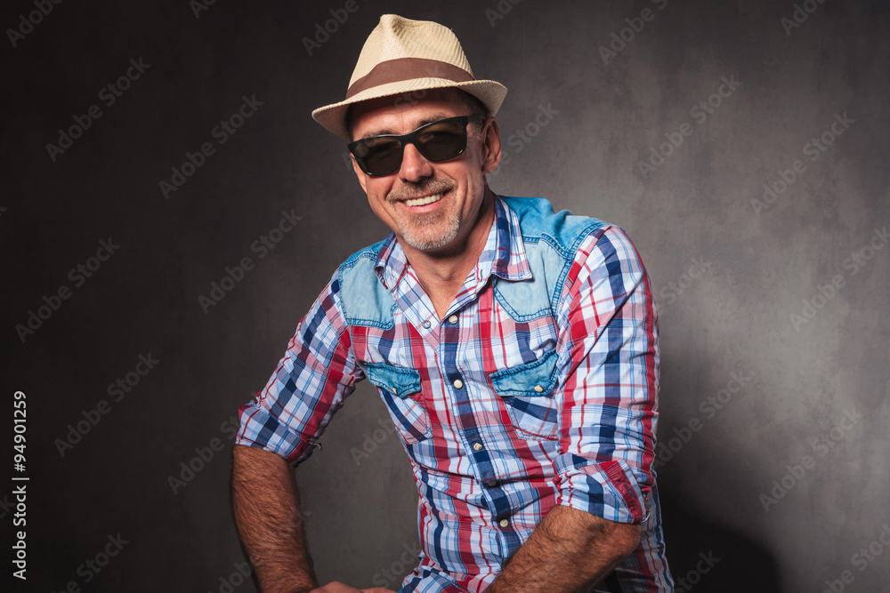 laughing old man in casual clothes and sunglasses laughing old man in casual clothes and sunglasses
