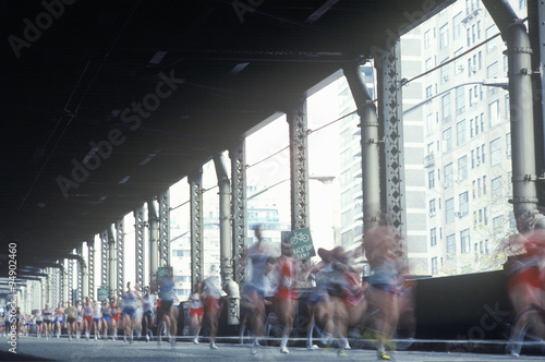 Runners crossing 1st Avenue/59th Street Bridge, NY City, NY Marathon photo