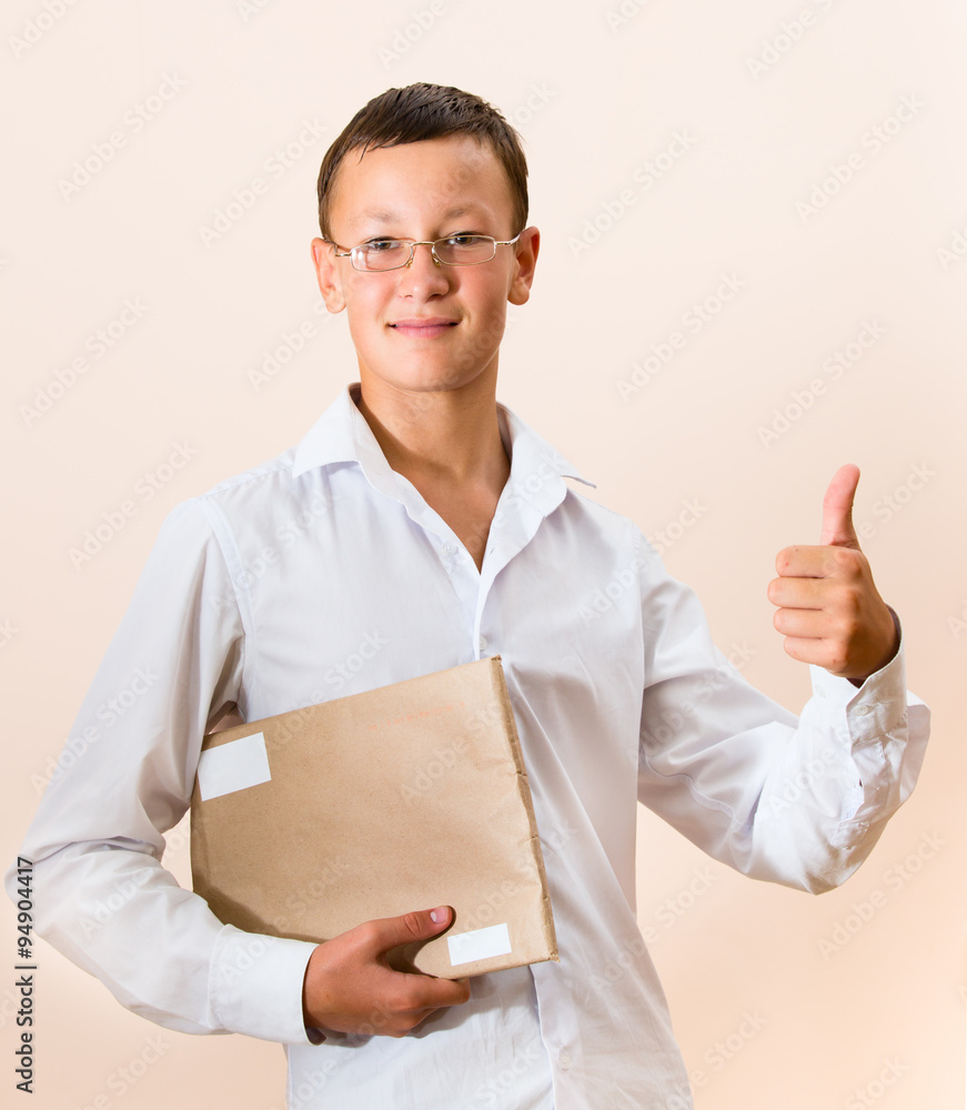 Boy with a bag of mail in the hands