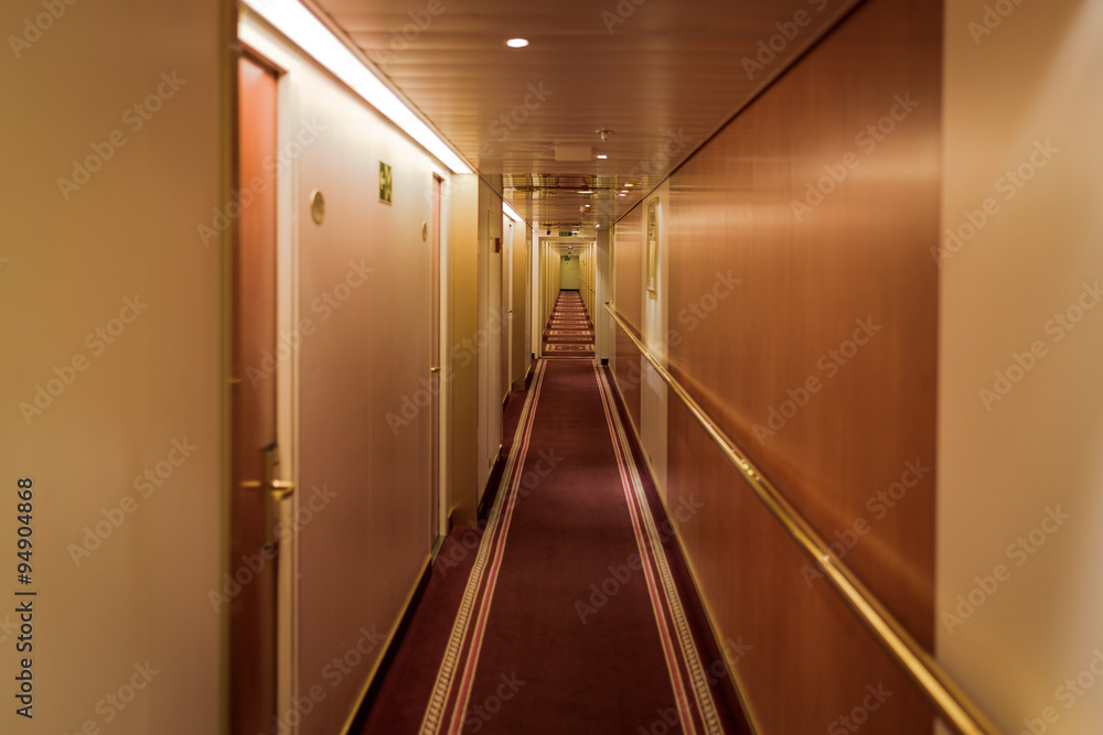 Narrow corridor with cabins