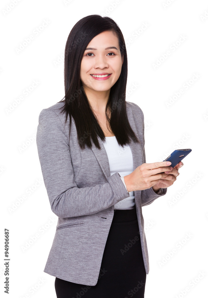 Asian Businesswoman use of the mobile phone