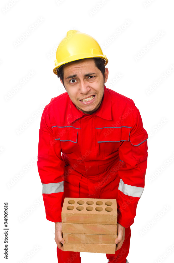 Construction worker with clay bricks on white Construction worker with clay bricks on white