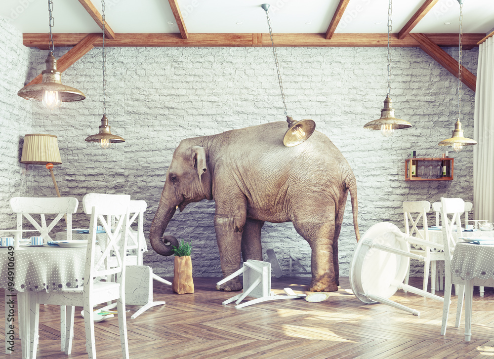 Naklejka premium elephant calm in a restaurant interior