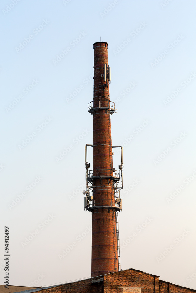 Base transceiver station on the old brick chimney Base transceiver station on the old brick chimney