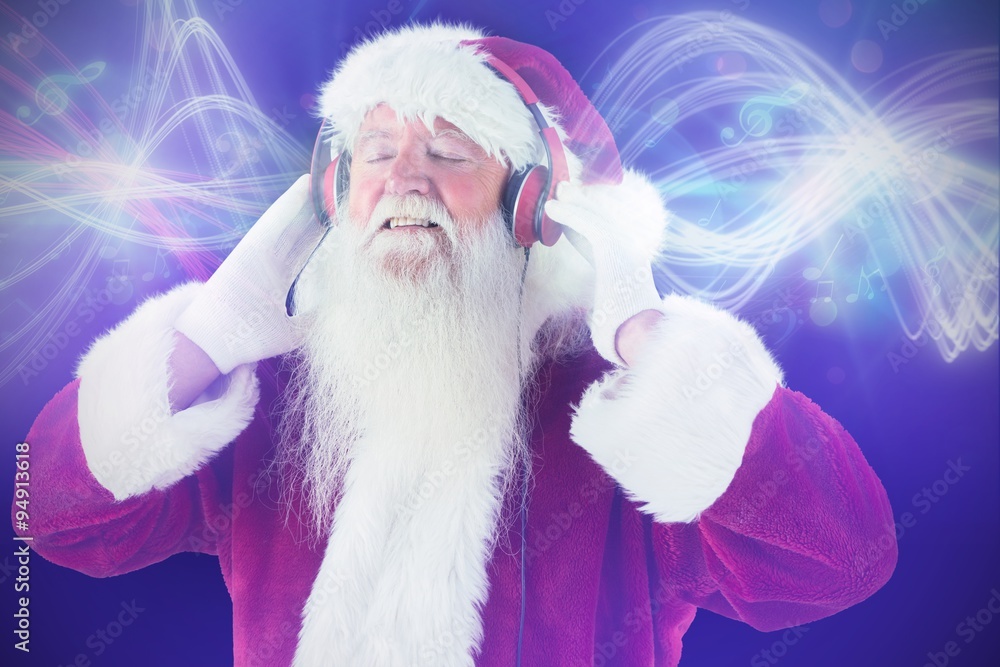 Composite image of santa claus enjoys some music Composite image of santa claus enjoys some music