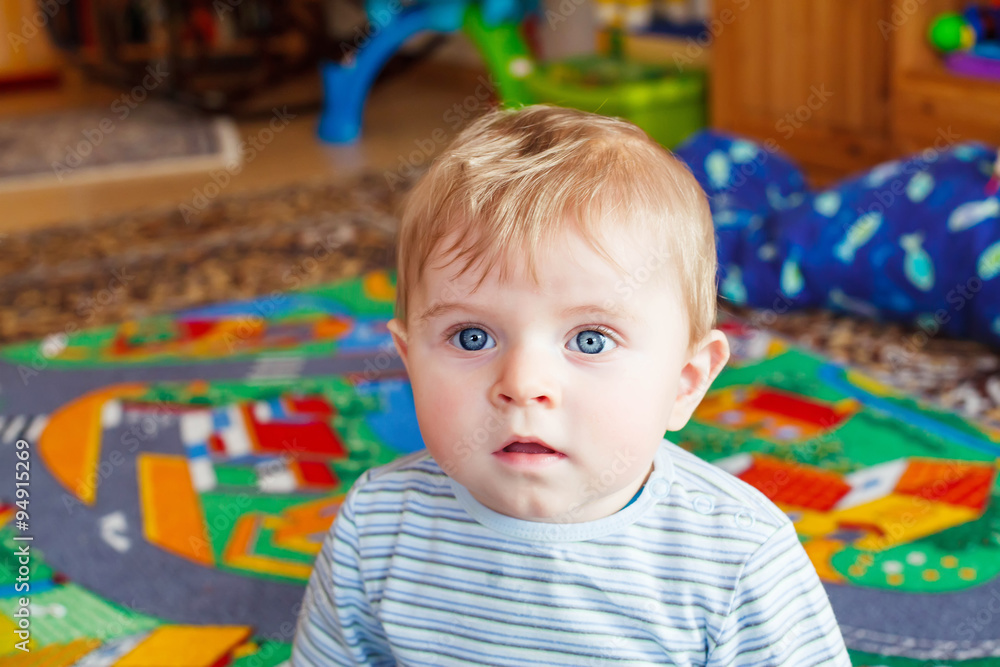little baby playing with different toys indoors little baby playing with different toys indoors