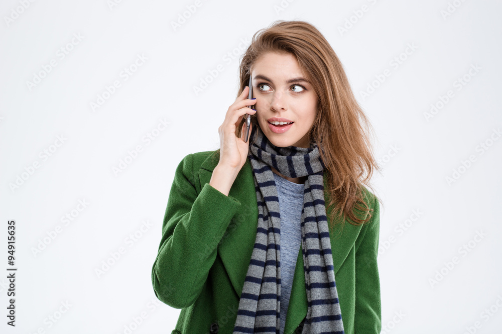 Happy woman talking on the phone and looking away Happy woman talking on the phone and looking away