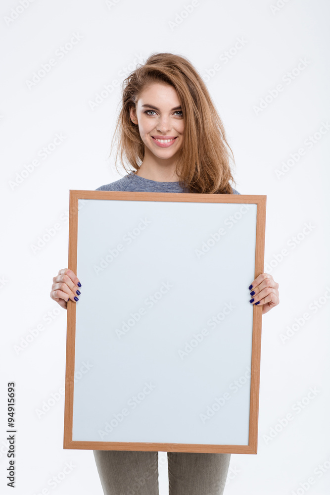 Smiling woman showing blank board Smiling woman showing blank board
