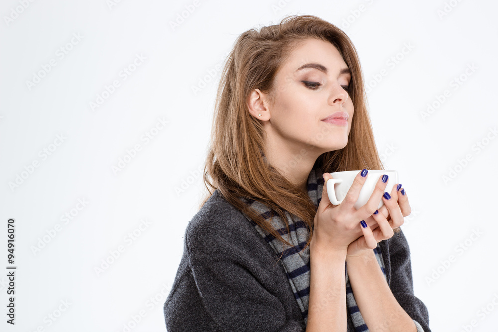 Cute woman smelling cup with coffee Cute woman smelling cup with coffee