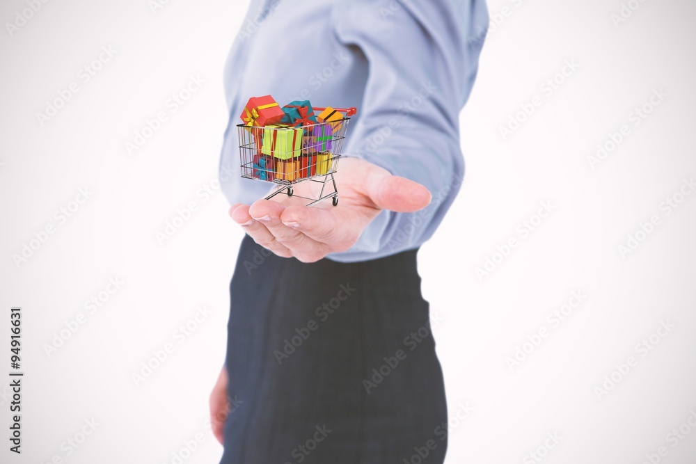Composite image of businesswoman presenting with hand Composite image of businesswoman presenting with hand