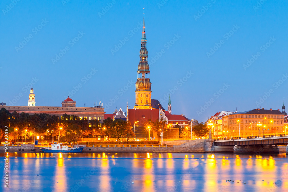 Riga. View  the Church of St. Peter at night.