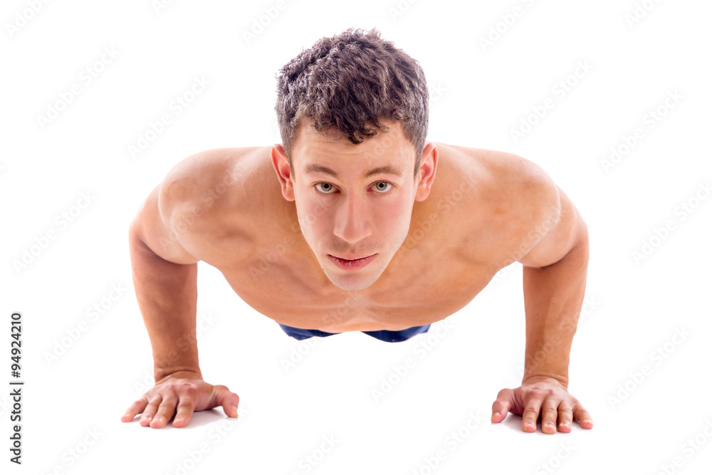 Muscular bodybuilder guy doing exercises Muscular bodybuilder guy doing exercises