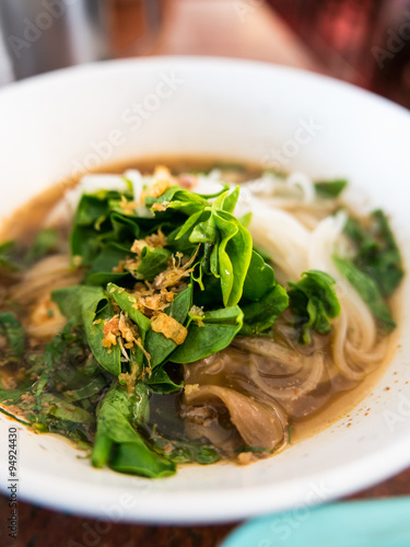 Noodle soup with fresh Melientha suavis photo