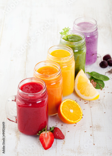 Smoothies, juices, beverages, drinks variety with fresh fruits and berries.