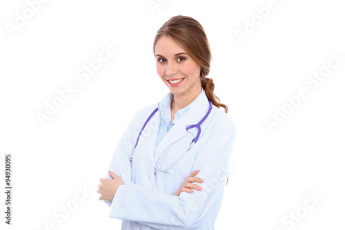 Friendly smiling young female doctor  isolated over white background