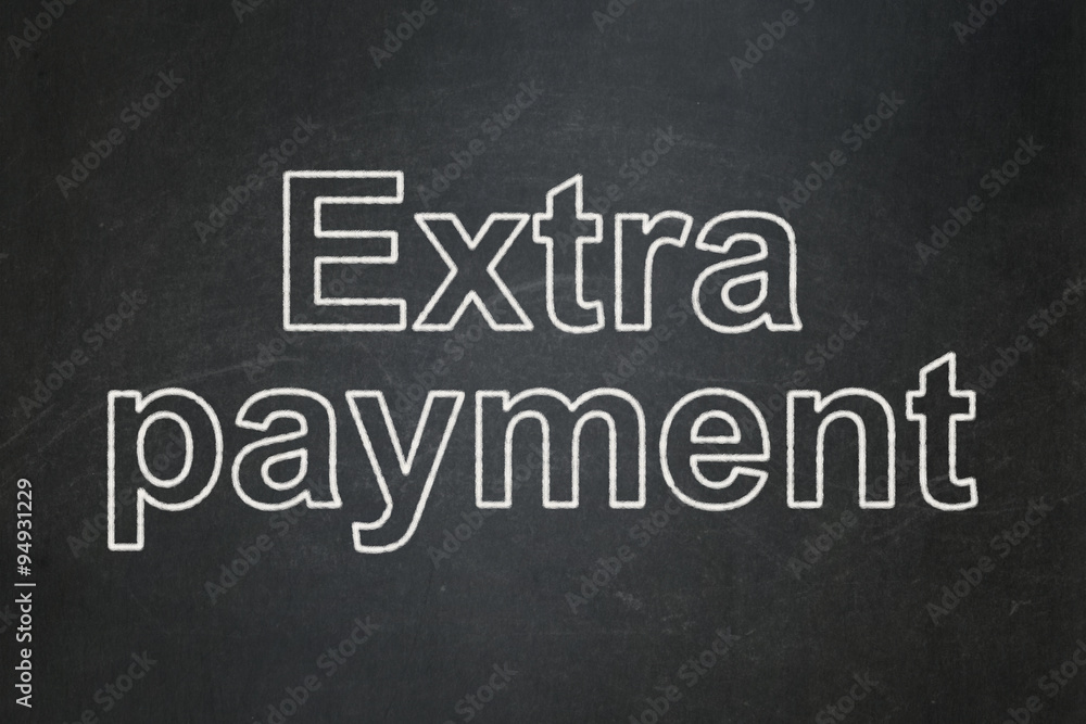 Currency concept: Extra Payment on chalkboard background Currency concept: Extra Payment on chalkboard background
