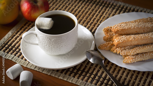 Fototapeta Naklejka Na Ścianę i Meble -  Perfect breakfast: cup of coffee, cheese sticks and fruit