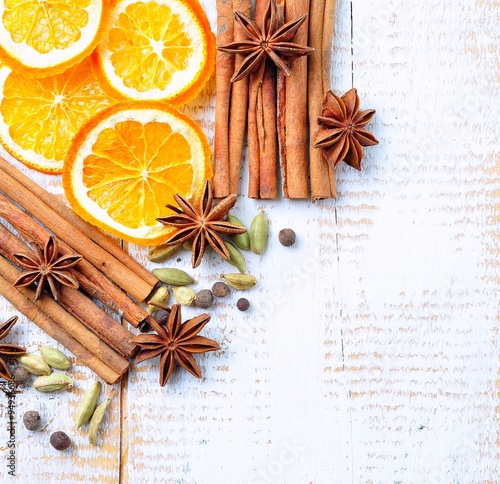 spices for mulled wine on a white wooden background. Christmas, New Year background.