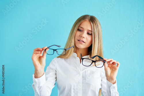 Pensive woman with glasses