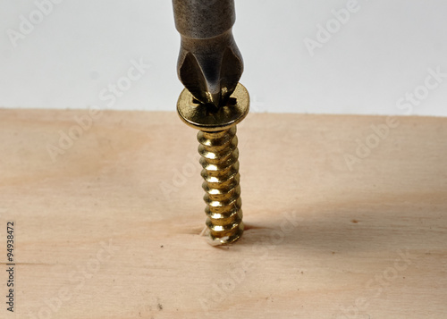 Fotografie tightening the screws