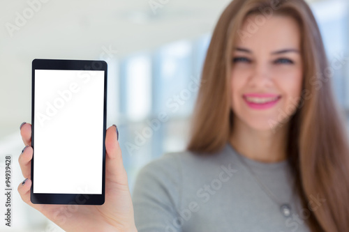 business woman holding smartphone in hand