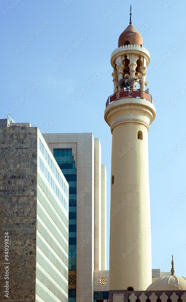 Bahrain, Manama, modern architectures and a minaret in the city center