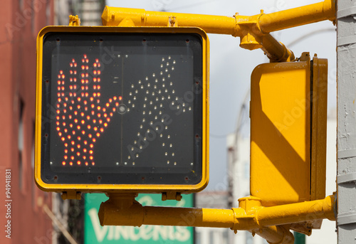 New York traffic light. pedestrian stop sign.