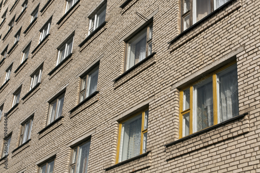 Brick house with windows.