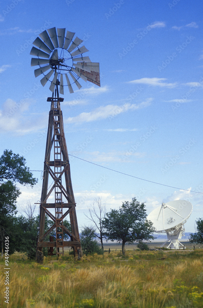 Radio telescope and old windmill at the National Radio Astronomy  Observatory in Socorro, NM Stock Photo | Adobe Stock