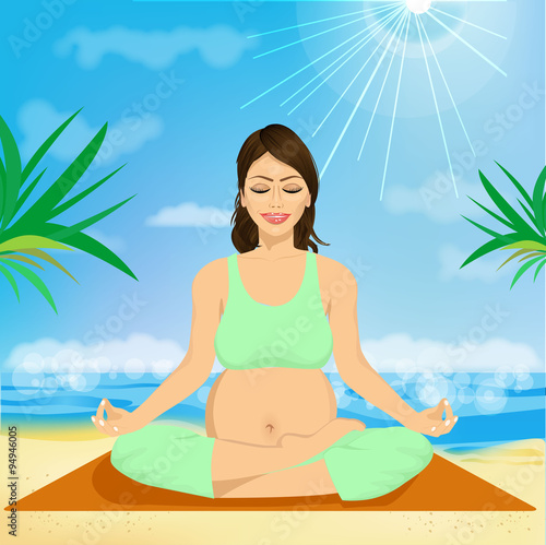 beautiful young pregnant woman sitting in yoga pose