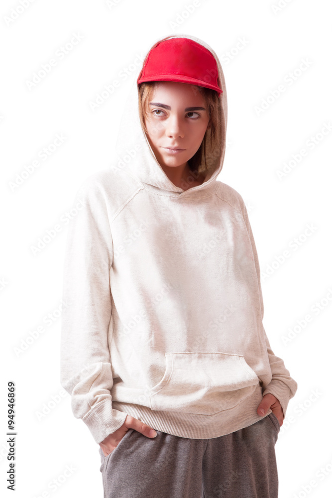 Teenager in a red cap and sportswear Teenager in a red cap and sportswear