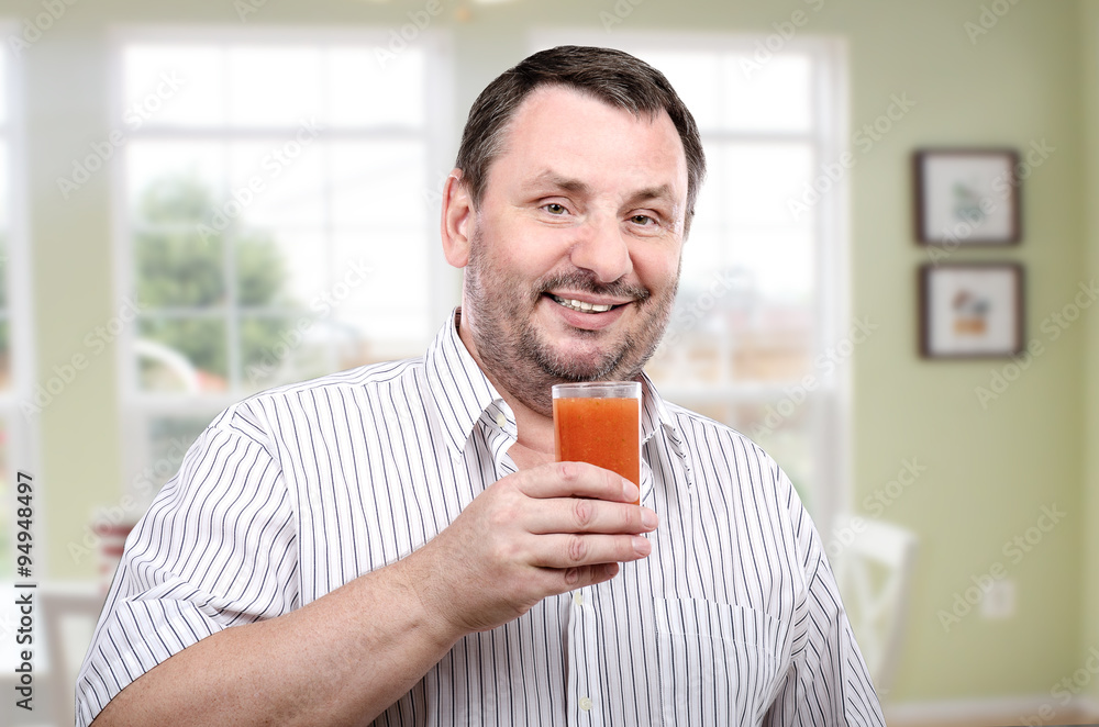 Fototapeta premium Man enjoying a detox drink