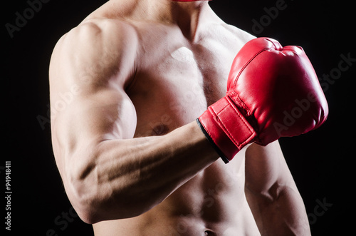Muscular man in boxing concept © Elnur