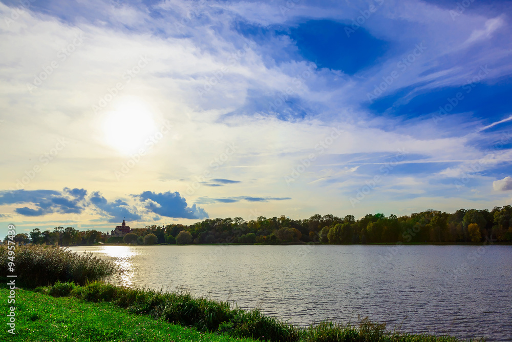 Fototapeta premium Landscape with Colorful Trees near Lake