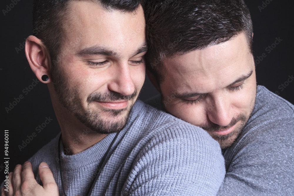 Gay couple on black background Gay couple on black background