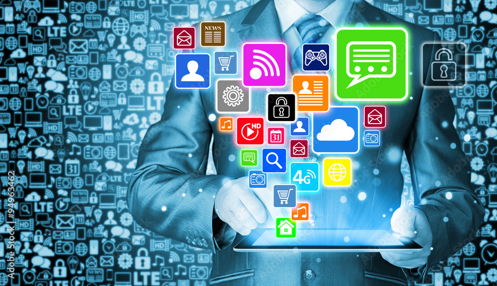 Business man using tablet PC with social media icon set Business man using tablet PC with social media icon set
