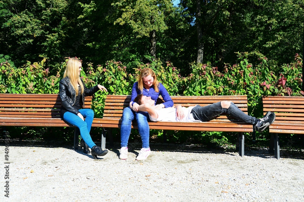 Love triangle in Vilnius town Bernardinu garden on autumn