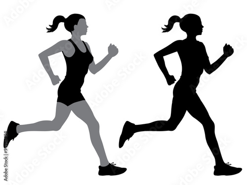 A female jogger in silhouette profile