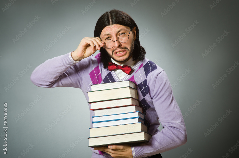 Young student with book in learning concept Young student with book in learning concept