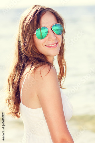 Young caucasian adult woman enjoying summer vacation