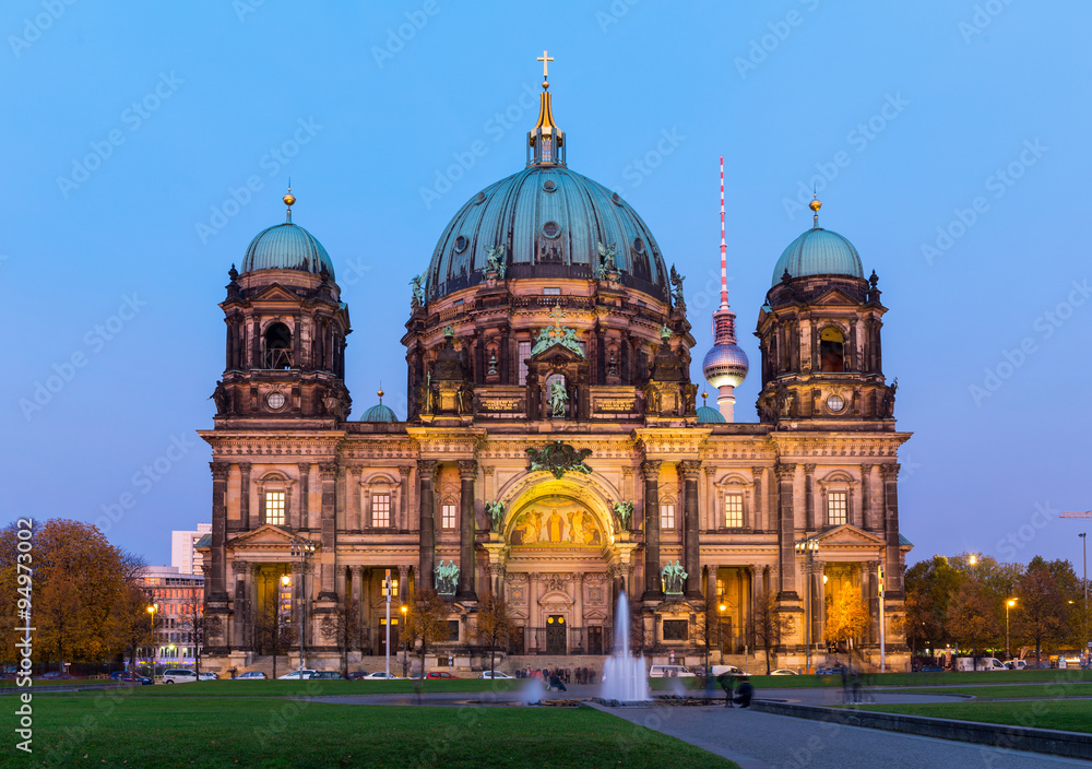 Berlin Cathedral with TV tower in the background at night