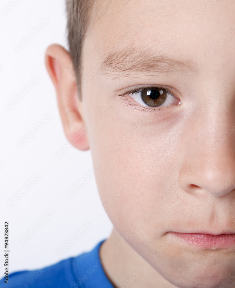 Photo of adorable young happy boy looking at camera. Photo of adorable young happy boy looking at camera.