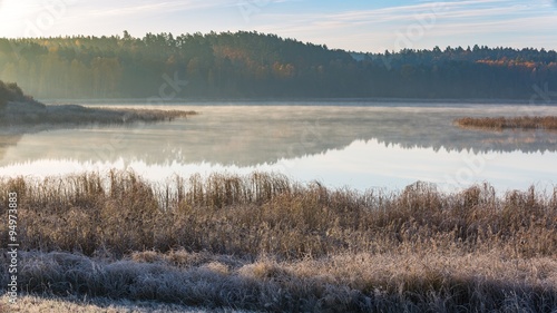 Morning lake at frosty autumn
