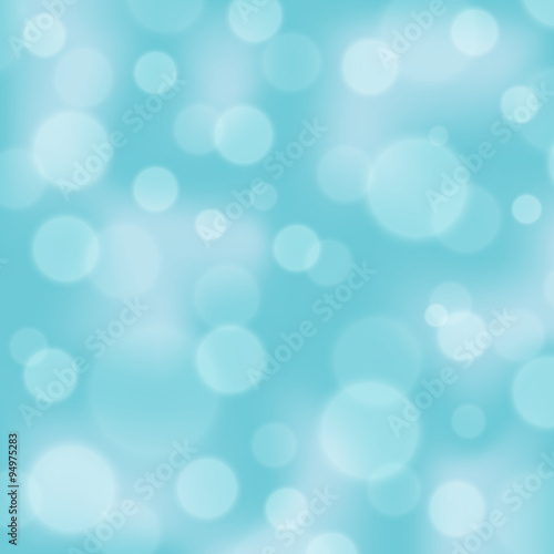 Light blue color bokeh vector background. Blurred light background with bokeh effect. Defocused backdrop in the color of sky and water.